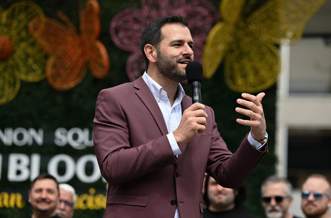 District 3 Supervisor Danny Sauter speaking outdoors into a microphone with his hand gesturing.